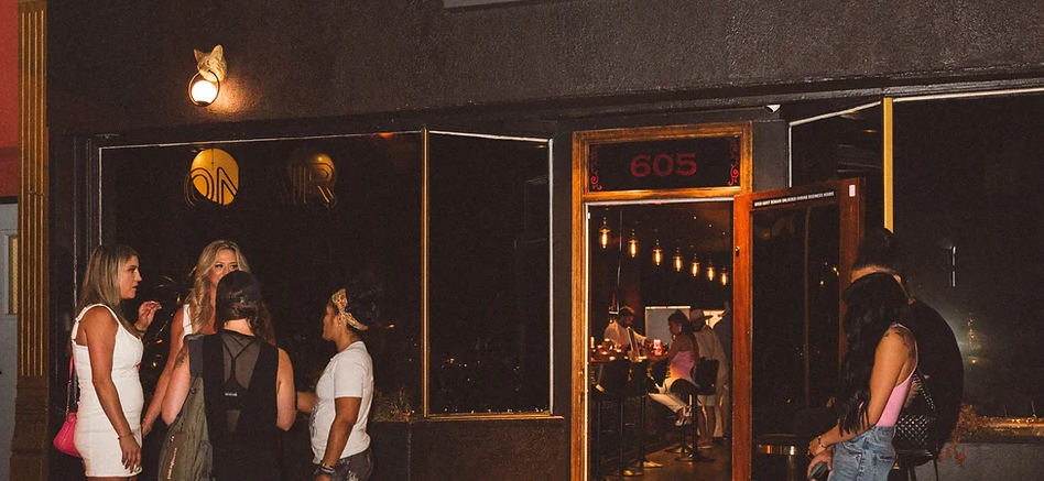outside photo of foxhole cocktail den