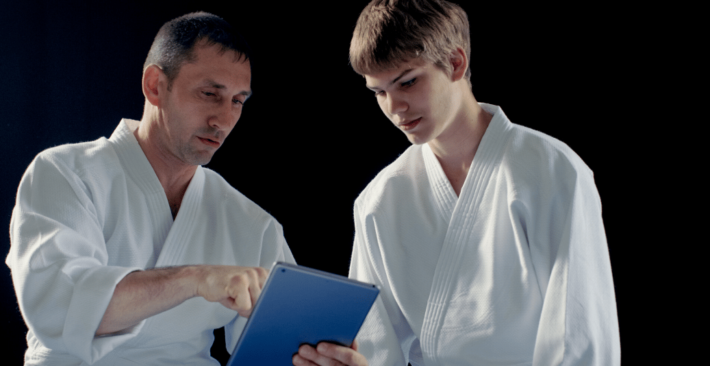 martial-arts-instructor-student-1037x534
